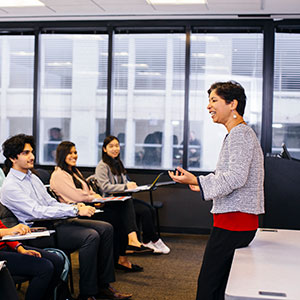 A professor teaching her class. Link to Life Stage Gift Planner Ages 60-70 Situations. lsgp_60-70.jpg