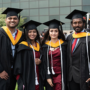 Graduate students smiling. Link to Life Stage Gift Planner Under Age 60 Situations. lsgp_60.jpg